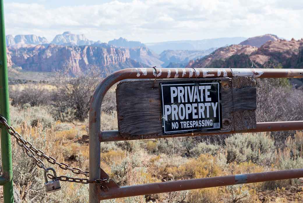 No trespassing sign overlooking Zion
